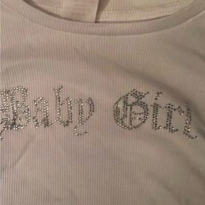 No Boundaries white blouse with "baby Girl" bedazzled on the front .Size small.